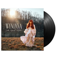 Vinyl record with album cover featuring a woman in a field and 'Wynonna' text.