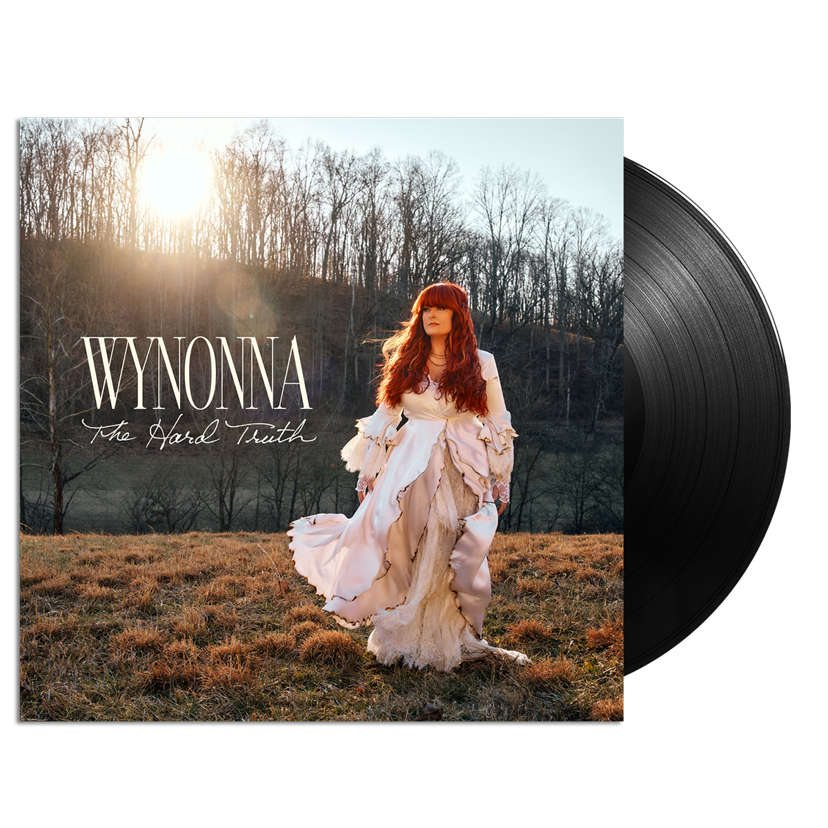 Vinyl record with album cover featuring a woman in a field and 'Wynonna' text.