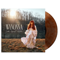Vinyl record with a cover featuring a woman in a field and the text 'Wynonna The Hard Truth'.