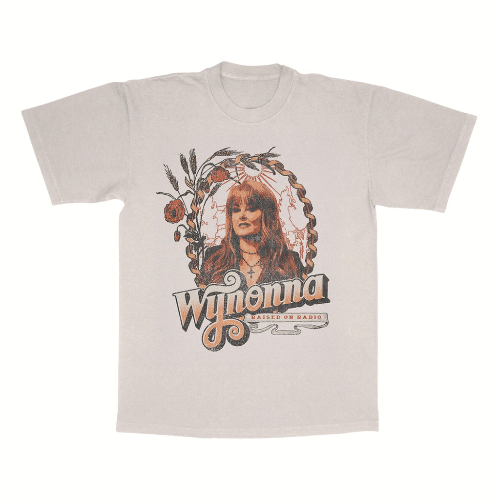 Classic fitting unisex tee in natural featuring a Wynonna Judd photo and Raised On Radio design printed on the front.