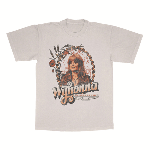 Classic fitting unisex tee in natural featuring a Wynonna Judd photo and Raised On Radio design printed on the front.